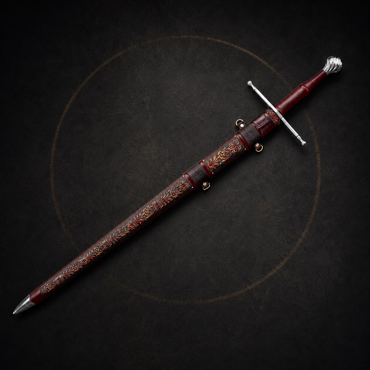 Crimson Lion longsword fully sheathed in ornate crimson leather scabbard